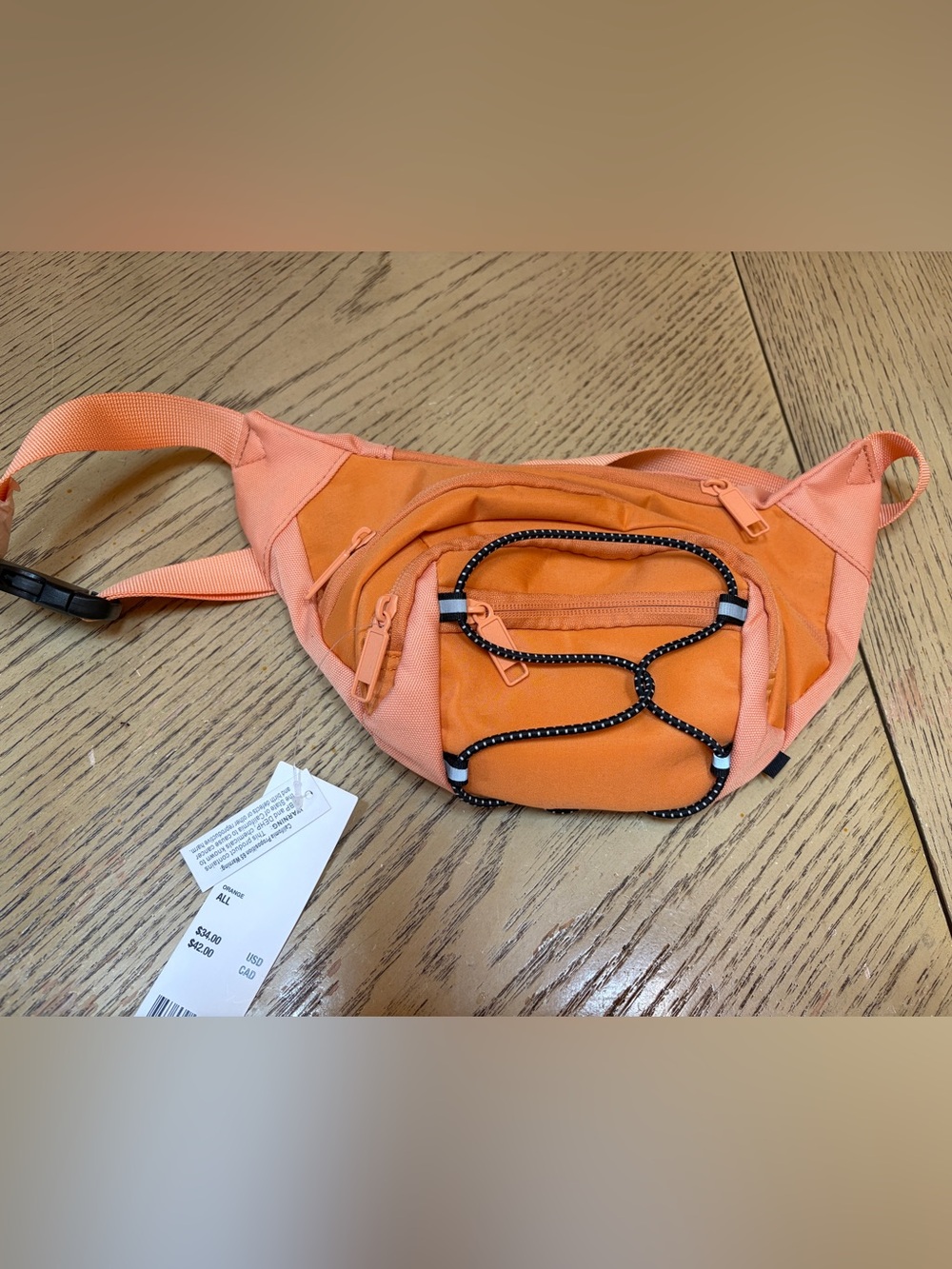 Urban Outfitters Orange Crossbody Waist Bag with Bungee Detail